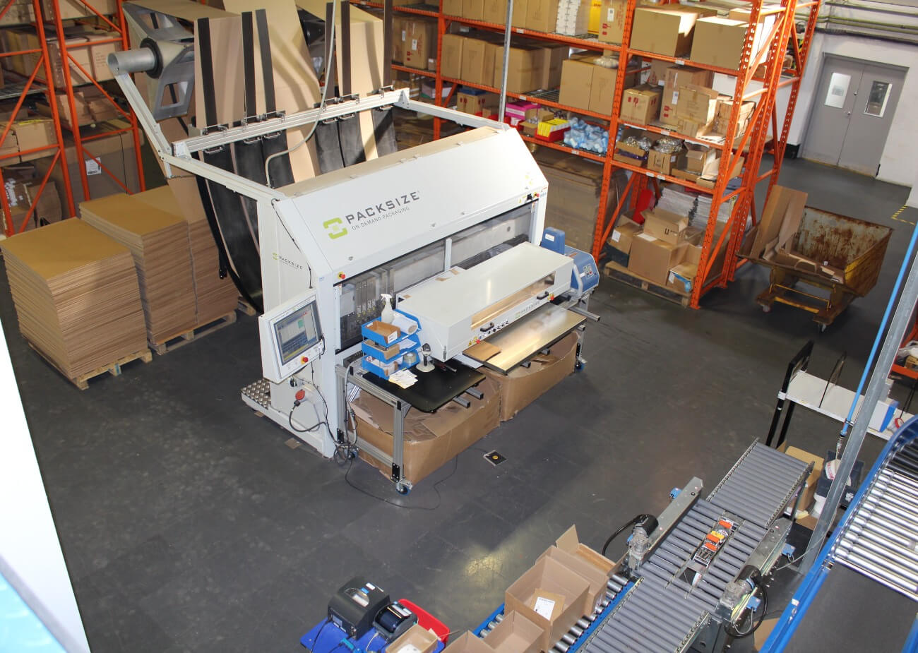 A photo of a Packsize automated packaging solution at a Culpitt facility.