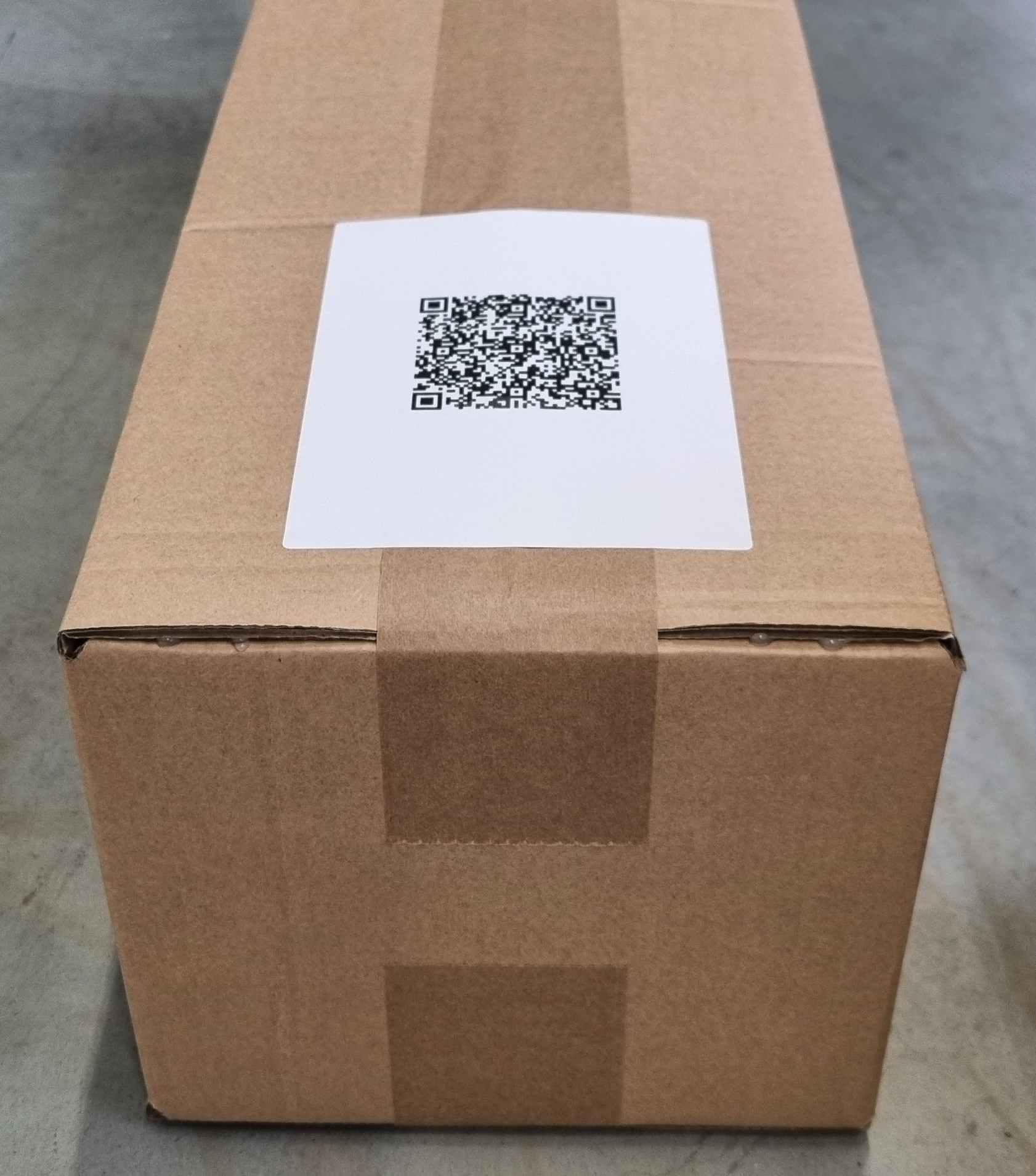 Right-sized & labeled Packsize box packed by packaging robots.